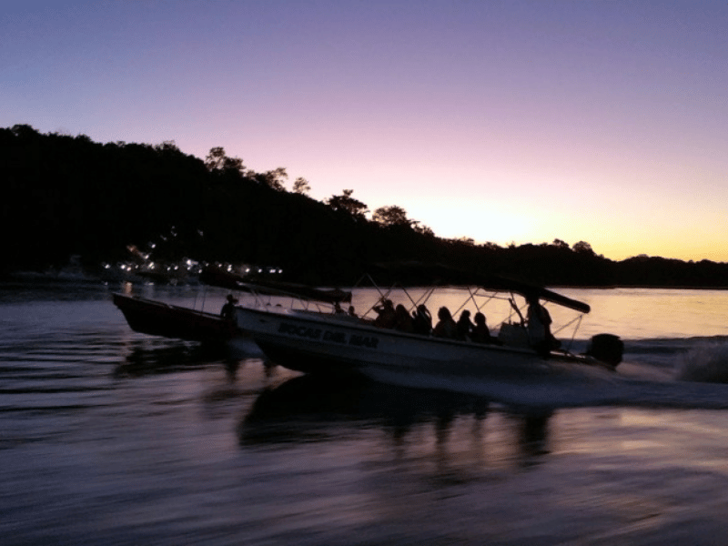 Boote im Sonnenuntergang bei Boca Chica