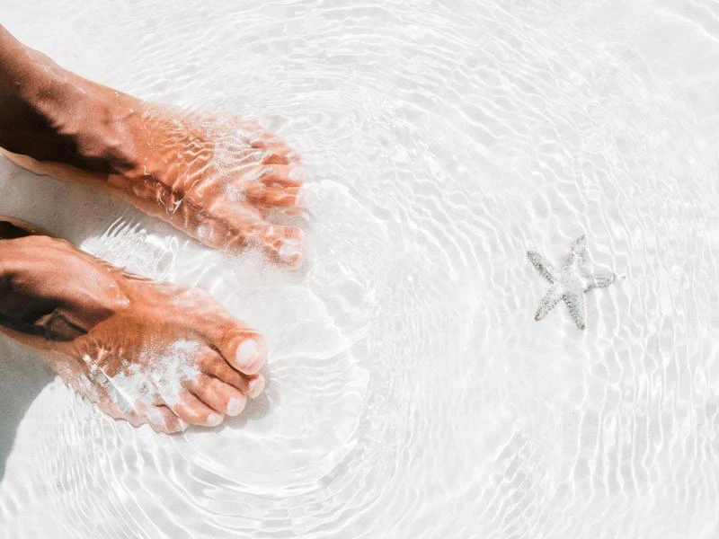 Fuesse im Sand in Mexiko