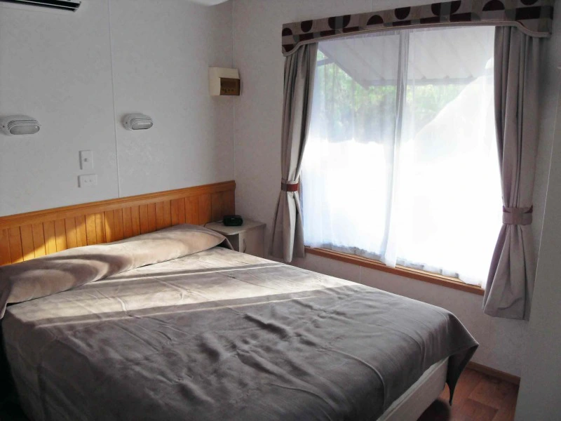 Schlafzimmer im Chalet in Katherine, Australien