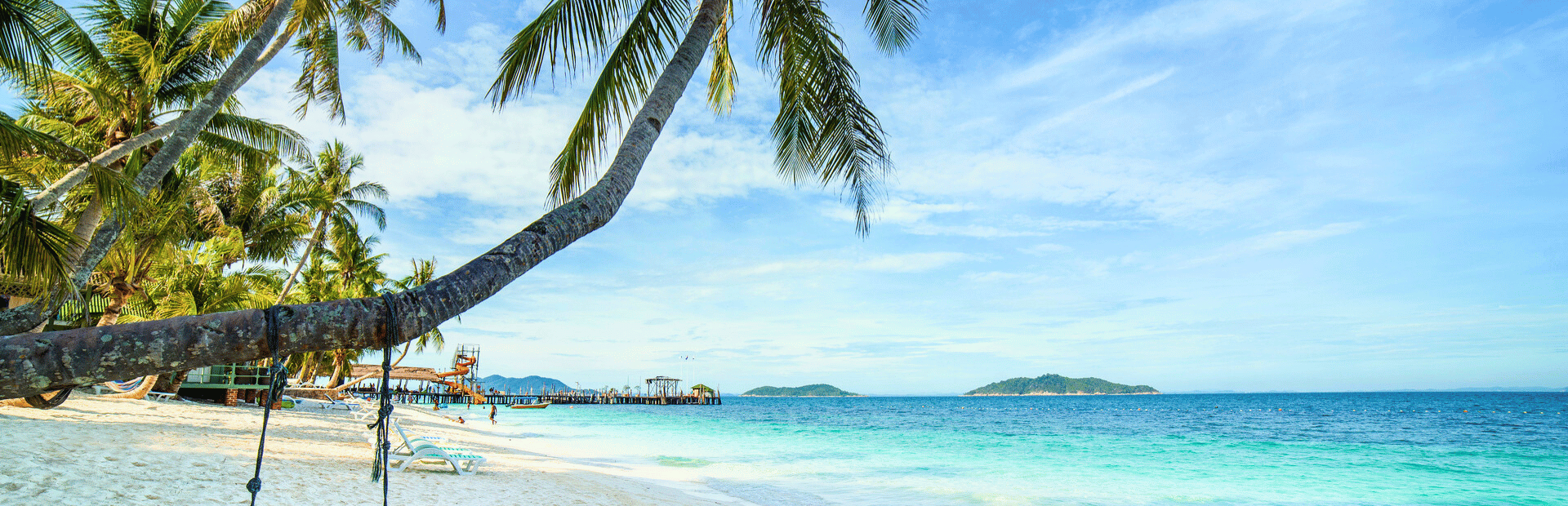 Strand und Palme auf Rawa Island, Malaysia