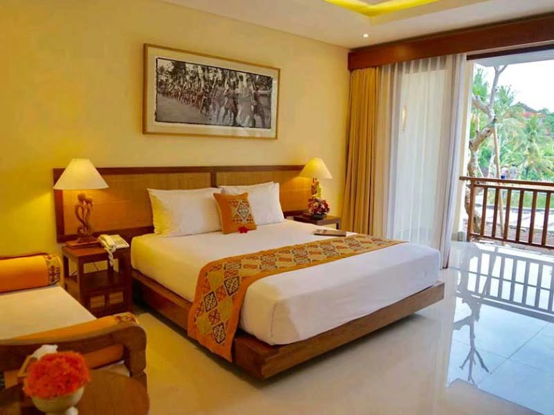 Eines der freundlich eingerichteten Zimmer einer Komfortunterkunft in Ubud