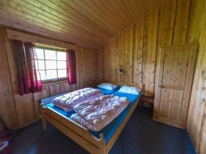 Schlafzimmer der Unterkunft in Dombås, Dovrefjell