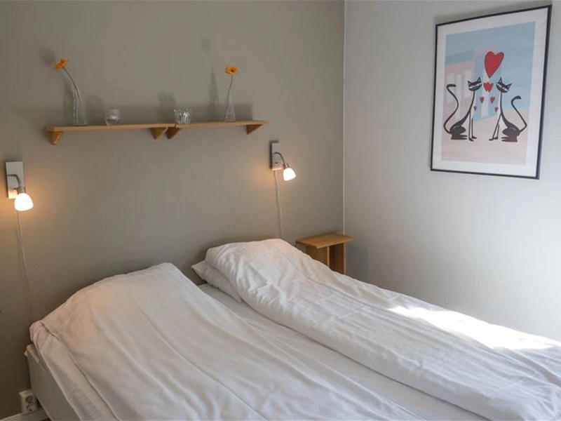 Schlafzimmer in der HĂĽtte in Fredriksberg, Schweden