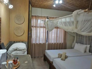 Namibia Etosha Familienreise Unterkunft gemütliches Schlafzimmer
