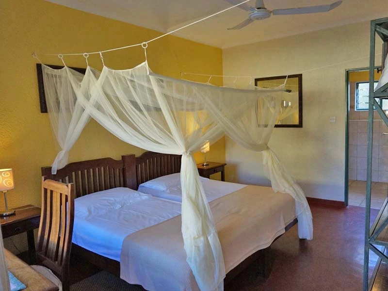 Namibia Botswana Familienreise Victoria Falls Unterkunft gemütliches Schlafzimmer