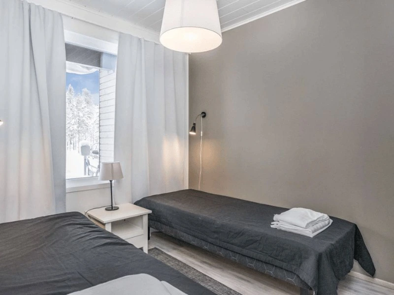 Schlafzimmer im Apartment in Paljakka